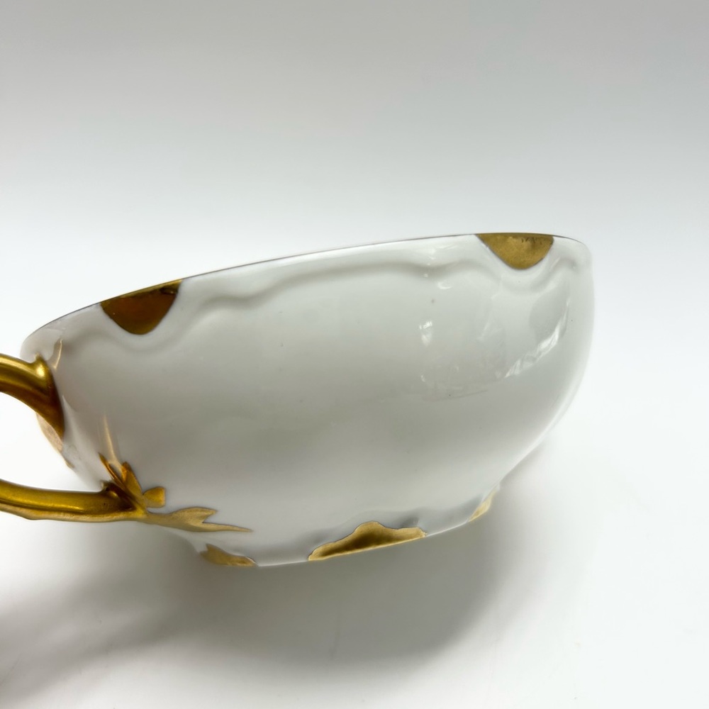 🔱☁️🔱☁️🔱☁️Haviland France - porcelain two handled cup.